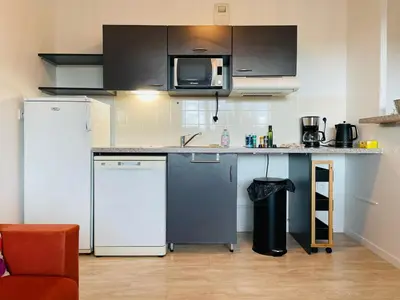 Cuisine ou kitchenette dans l'établissement Terrasse & Confort à Rouen - 396