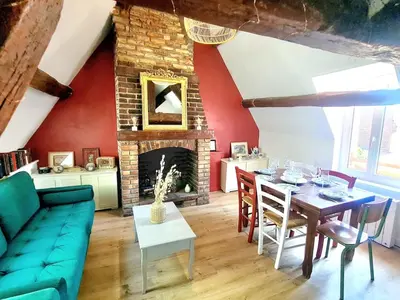 Coin salon dans l'établissement Appartement cosy & mezzanines