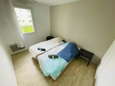 Un ou plusieurs lits dans un hébergement de l'établissement Séjour idéal à Rouen - 392