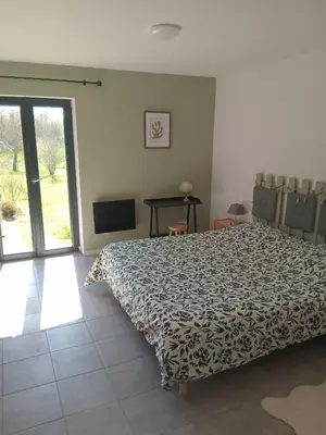Un ou plusieurs lits dans un hébergement de l'établissement Chambre proche Giverny