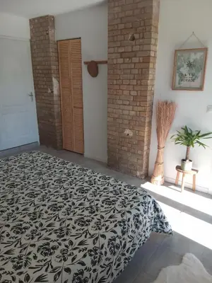 Un ou plusieurs lits dans un hébergement de l'établissement Chambre proche Giverny