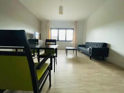 Coin salon dans l'établissement T3 familial et tout confort - 391