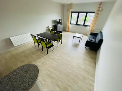 Coin salon dans l'établissement T3 familial et tout confort - 391