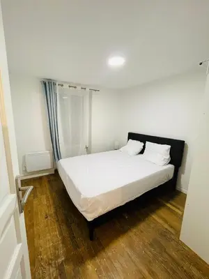 Un ou plusieurs lits dans un hébergement de l'établissement Magnifique Appartement rénové en juin 2025