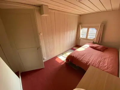 Un ou plusieurs lits dans un hébergement de l'établissement Superbe appartement calme et indépendant