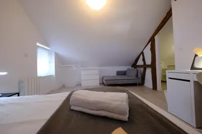 Un ou plusieurs lits dans un hébergement de l'établissement Proche Rouen - Magnifique T4 - 3 chambres