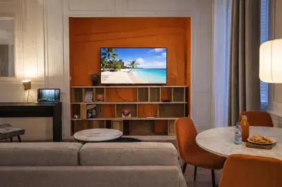 Télévision ou salle de divertissement dans l'établissement L'Hauss'Rouennais - Appartement 2 pièces - Centre historique Rouen