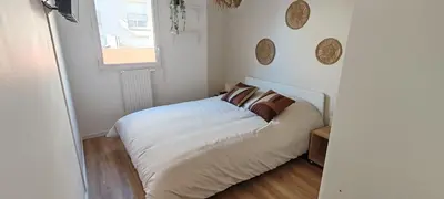 Un ou plusieurs lits dans un hébergement de l'établissement Appartement L'Accès Rouen 10' Centre Historique