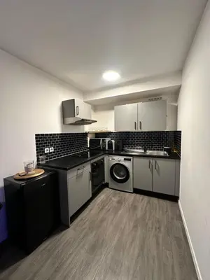Cuisine ou kitchenette dans l'établissement Appartement luxueux avec jacuzzi Cergy gare