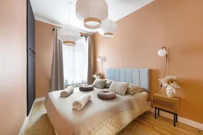 Un ou plusieurs lits dans un hébergement de l'établissement Casa Tierra - Élégance et sérénité en centre-ville