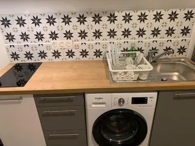 Cuisine ou kitchenette dans l'établissement Duplex T2 A3M Locations