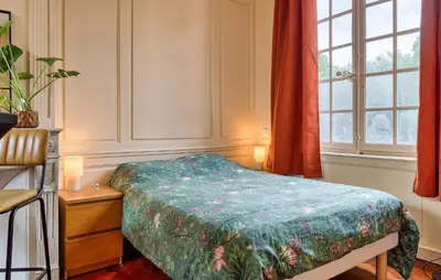 Un ou plusieurs lits dans un hébergement de l'établissement Cozy Apartment In Les Andelys With Wifi