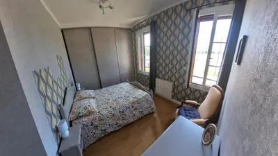 Un ou plusieurs lits dans un hébergement de l'établissement Gîte des Roses