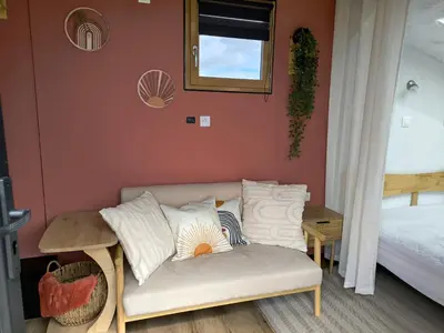 Un ou plusieurs lits dans un hébergement de l'établissement La Mini Éole - Séjour insolite entre Rouen et Dieppe