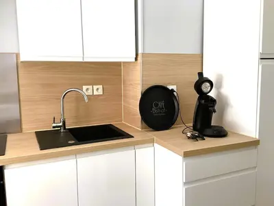 Cuisine ou kitchenette dans l'établissement Un des sens, vue port, Sauna et Spa