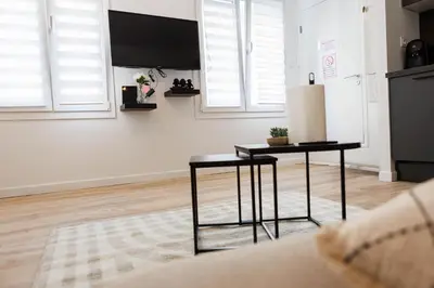 Télévision ou salle de divertissement dans l'établissement Le Soleil Cormeillais