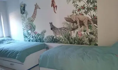 Un ou plusieurs lits dans un hébergement de l'établissement tranquillité- jardin- WIFI- gite Père Louis