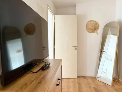 Télévision ou salle de divertissement dans l'établissement Appartement le Cocoon, 5 min du port