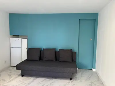 Coin salon dans l'établissement Charmant appartement moderne