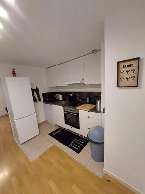 Cuisine ou kitchenette dans l'établissement Cosy Home 4 - Spacieux studio avec parking - 30 min Paris