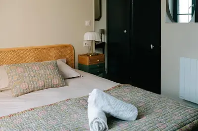 Un ou plusieurs lits dans un hébergement de l'établissement Maison Eudoise, piscine et spa