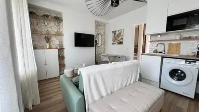 Cuisine ou kitchenette dans l'établissement Le Refuge Urbain