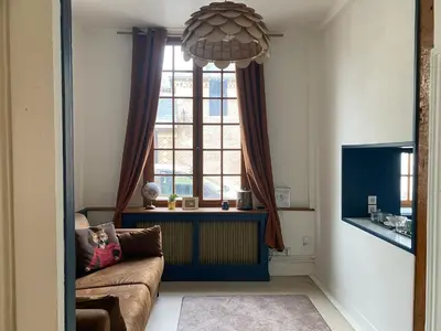 Coin salon dans l'établissement Appartement confortable aux Andelys - 90 m² avec parking