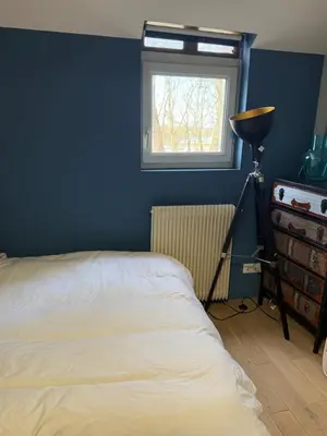 Un ou plusieurs lits dans un hébergement de l'établissement La chambre du Parc
