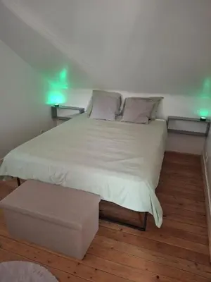Un ou plusieurs lits dans un hébergement de l'établissement Appartement Centre ville 2 ou 4 personnes