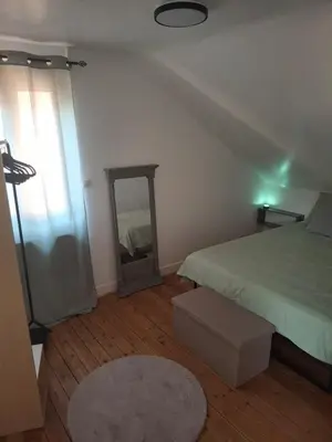 Un ou plusieurs lits dans un hébergement de l'établissement Appartement Centre ville 2 ou 4 personnes