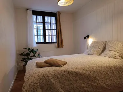 Un ou plusieurs lits dans un hébergement de l'établissement Hypercenter apartment