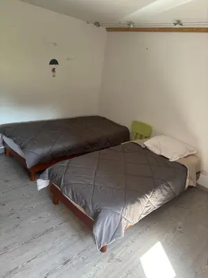 Un ou plusieurs lits dans un hébergement de l'établissement Gîte des vaux