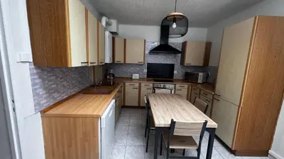 Cuisine ou kitchenette dans l'établissement L amienoise