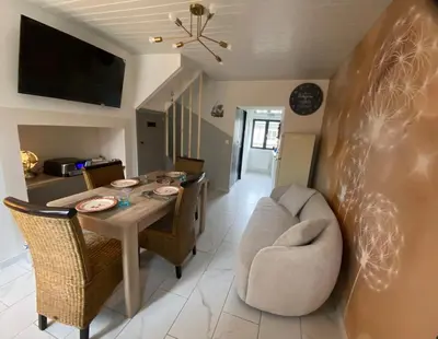 Télévision ou salle de divertissement dans l'établissement L air marin
