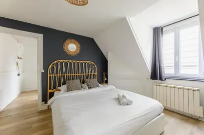 Un ou plusieurs lits dans un hébergement de l'établissement Cabane Cosy près de la fac - calme et confort