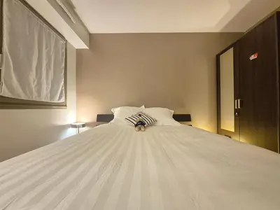 Un ou plusieurs lits dans un hébergement de l'établissement Appartement Le Sea's Home Centre Historique