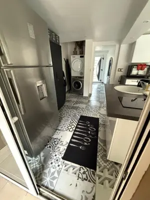 Cuisine ou kitchenette dans l'établissement Sddeco