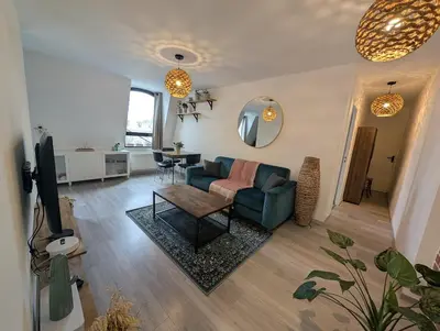 Télévision ou salle de divertissement dans l'établissement Charmant T2 centre-ville Amiens
