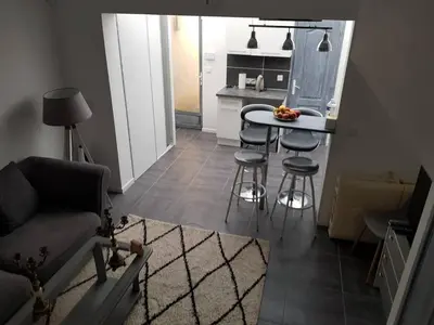 Cuisine ou kitchenette dans l'établissement Duplex cosy à quelles minutes à pied du centre ville