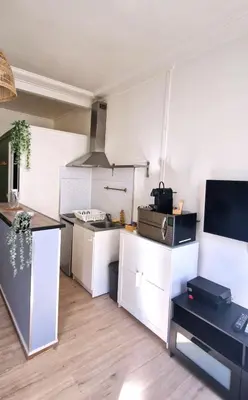Cuisine ou kitchenette dans l'établissement Les Augustins