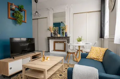 Télévision ou salle de divertissement dans l'établissement Au cœur de Rouen
