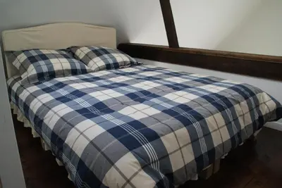 Un ou plusieurs lits dans un hébergement de l'établissement Le Gîte De Malaunay