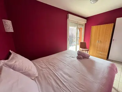 Un ou plusieurs lits dans un hébergement de l'établissement Gîte 6 chambres du Moulin de Fourges privatisable - 19 personnes