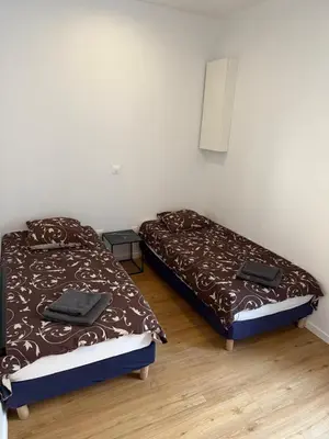 Un ou plusieurs lits dans un hébergement de l'établissement Appartement Magnifique
