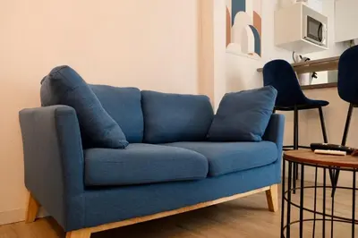 Coin salon dans l'établissement Rouen - Studio indépendant avec cour