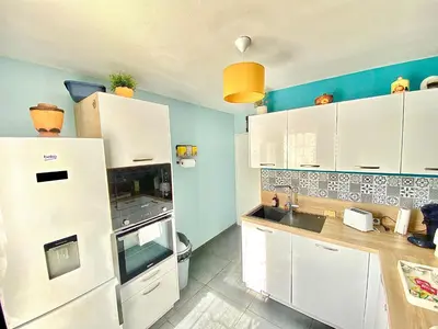 Cuisine ou kitchenette dans l'établissement Grand duplex, Centre, Parking, 4 ch, Lingerie - 7 pers