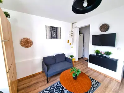 Coin salon dans l'établissement Le calme à deux pas de tout