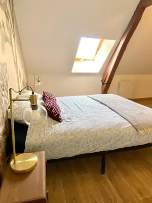 Un ou plusieurs lits dans un hébergement de l'établissement La maison des Hortillonnages, le calme dans Amiens