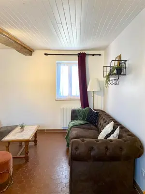 Coin salon dans l'établissement La maison des Hortillonnages, le calme dans Amiens