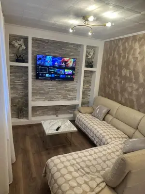 Télévision ou salle de divertissement dans l'établissement Maison individuelle, 3chambres, avec parking